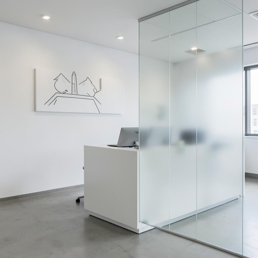 Office & Wall Branding — Frosted glass film, wall graphics and wayfinding.
