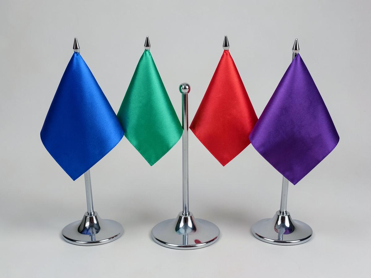 Satin Table Flags — Satin Table Flags branded to your artwork — 110gsm knitted polyester options, single or double-sided print and full colour matching, produced in Dubai.