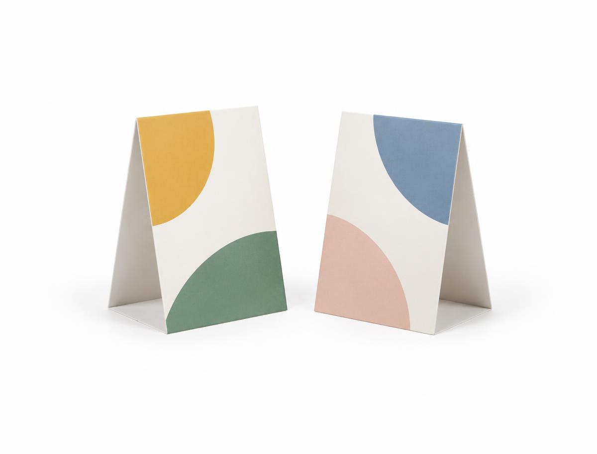 Table Tents — Table Tents branded to your artwork — 130gsm gloss art paper options, matt lamination and full colour matching, produced in Dubai.
